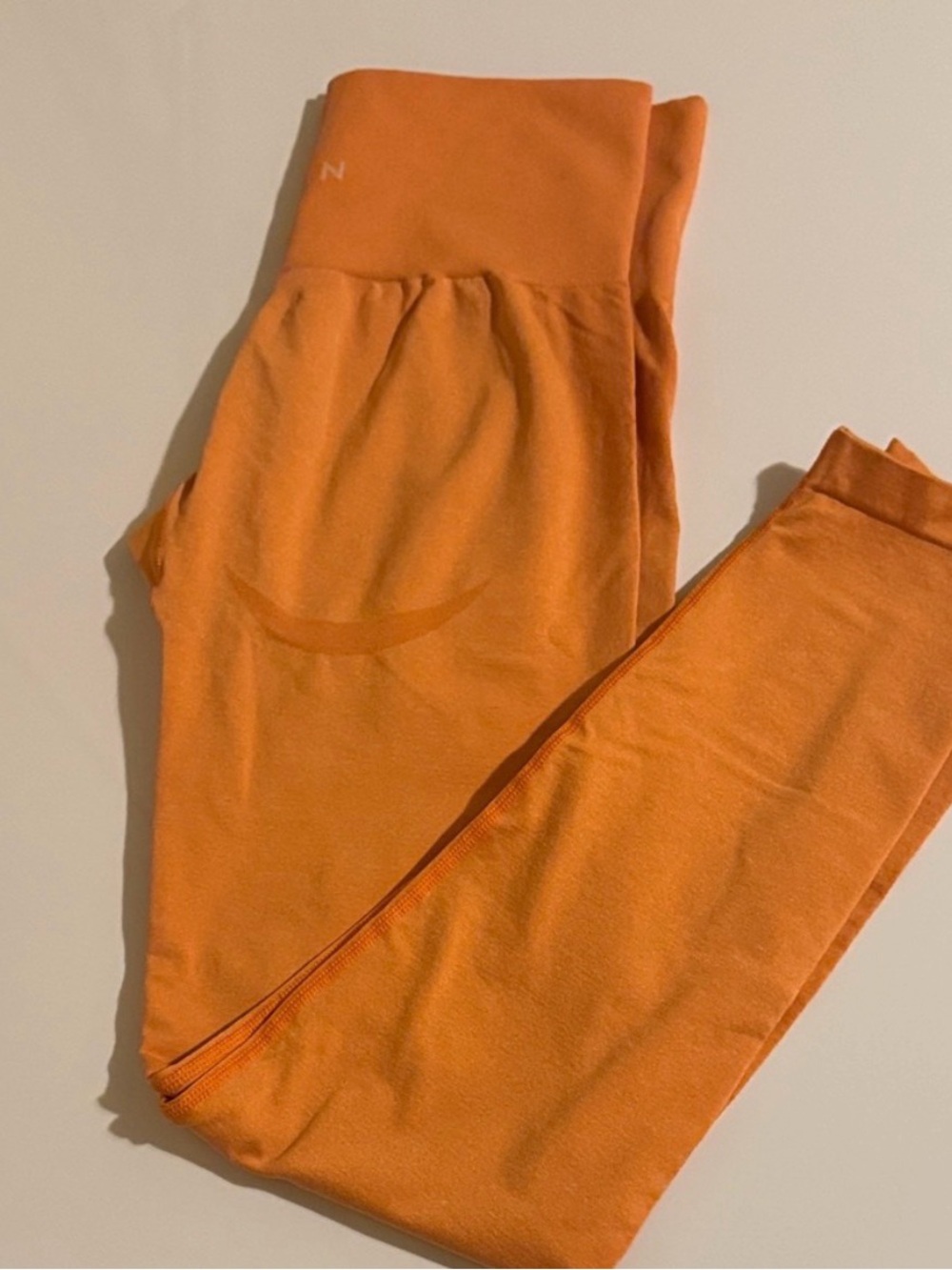 NVGTN Orange High-Waist Yoga Pants